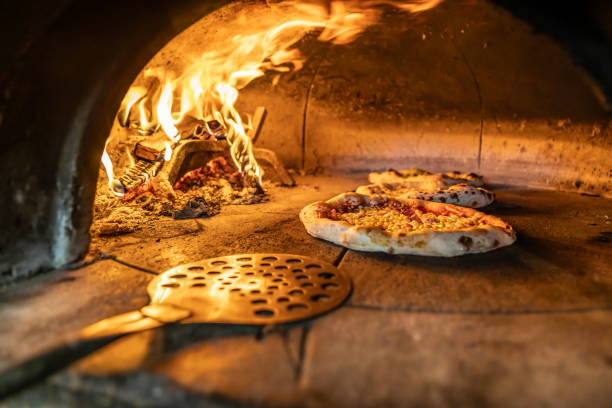 Pizze nel forno a legna di Pizzeria Sud